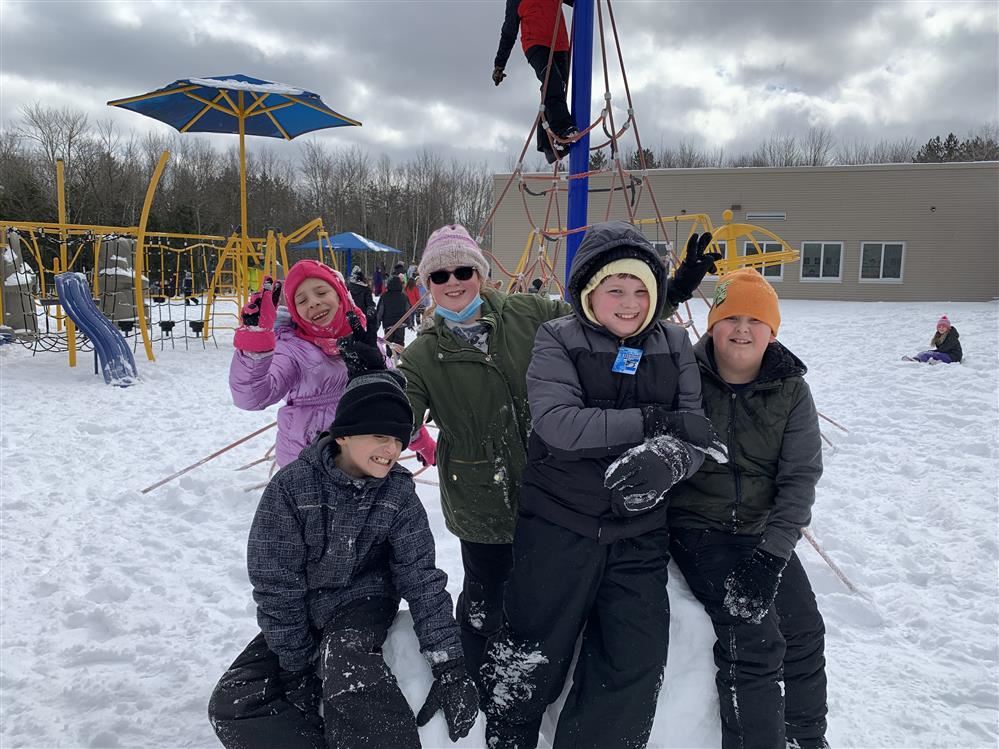 Students enjoying a fun snow day. Students enjoying a fun snow day.