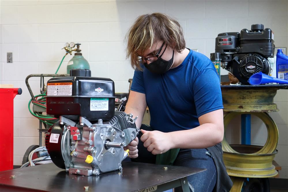 Student hard at work in our small engines class. Student hard at work in our small engines class.